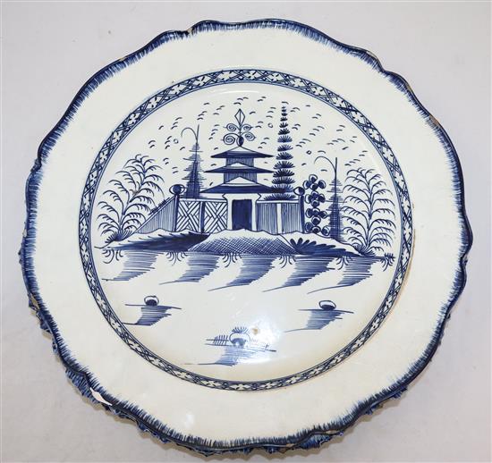 A pair of pearlware blue and white dishes and another similar pearlware dish, late 18th century, both diam. 35.5cm